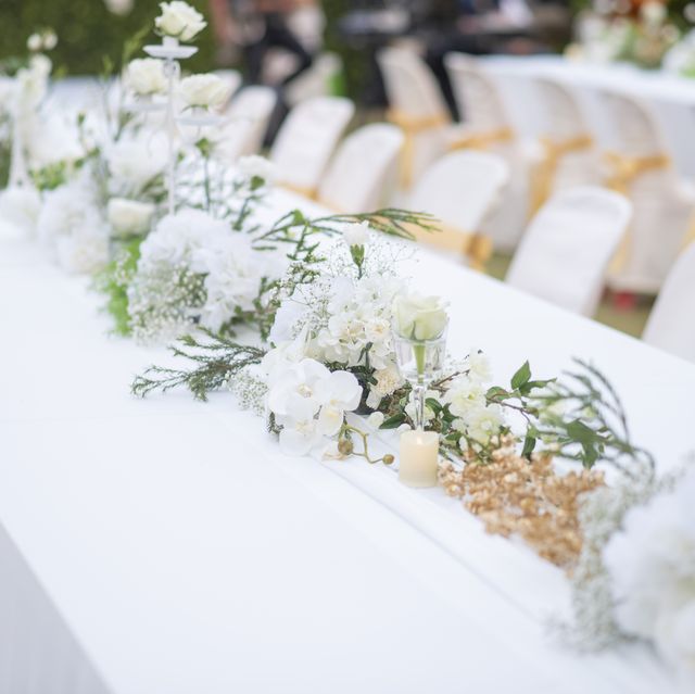 close up of flowers on table at wedding ceremony royalty free image