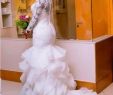 Bodycon Wedding Dress Lovely south African Nigerian Mermaid Wedding Dresses Plus Size 2018 Long Sleeve Sheer Neck Bodycon Fishtail Bridal Gowns Beaded Chic Layer Ruffles Cheap