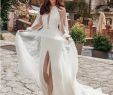 Dramatic Wedding Dresses Fresh these Wedding Gowns Feature In Trend Details Like Crisp Minimalist Lines with Striking Cutouts Dramatic Sleeves and Illusion Bodices 50 Dress