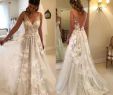 Dresses to attend A Wedding Unique Beach Vestido De Noiva 2018 Wedding Dresses A Line V Neck Tulle Lace Backless Dubai Arabic Boho Wedding Gown Bridal Dresses