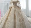 Gold Beaded Wedding Dress Unique Ball Gown Champagne Tulle Gold Lace Appliques Ruff Sleeve