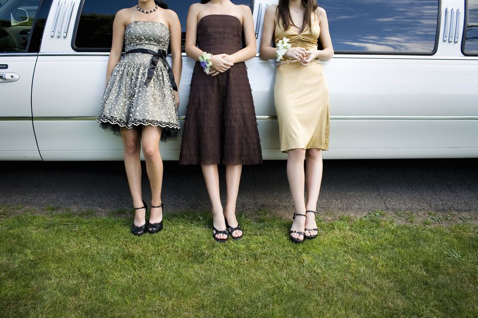 three teenage girls 14 18 in formal dresses beside limo low section 001 df78c6f6af6f198