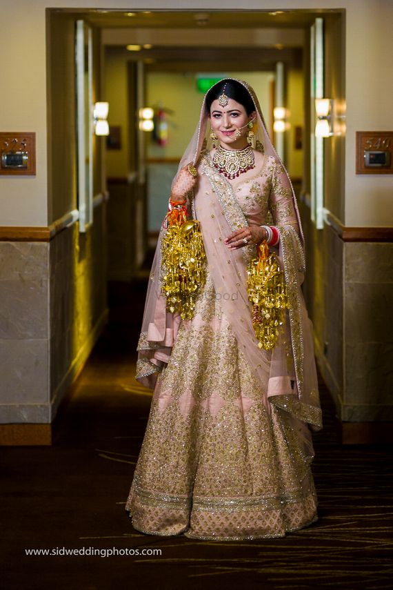 Pink and Gold Wedding Dress Beautiful Of Bride In Light Pink and Gold Lehenga and Golden Kaleere