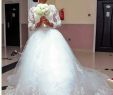 Simple Plus Size Wedding Dresses New 2018 New Cheap Ball Gown Wedding Dresses Illusion Jewel Sequins Sweep Train African with Long Sleeves Puffy Tulle Plus Size Bridal Gowns