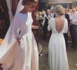 Very Simple Wedding Dresses Beautiful Discount Simple Wedding Dresses Romantic A Line Long Sleeves Open Backless Satin Special Occasion Mopping Section Ivory White Bridal Gowns Wedding