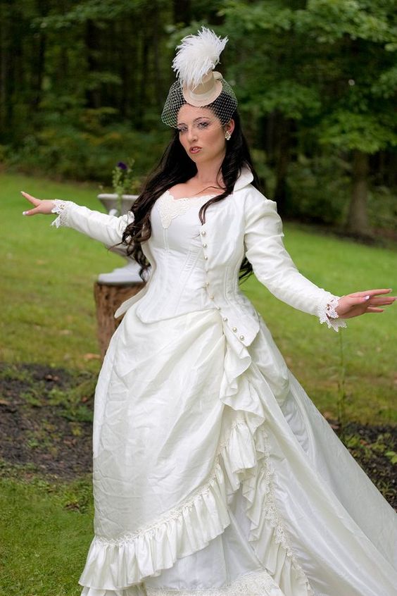 04 ivory Victorian steampunk wedding gown and a hat with a veil