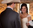 Wedding Dress and Boots Unique Western Wedding with Rustic Décor at the Oldest Barn In Iowa